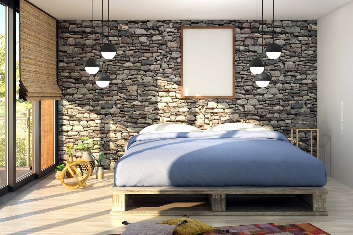 immobilie-wohnen-schlafzimmer-industry-style-look-einrichtung-tipps-tricks-beispiel-bett-wand-palette-dekoration